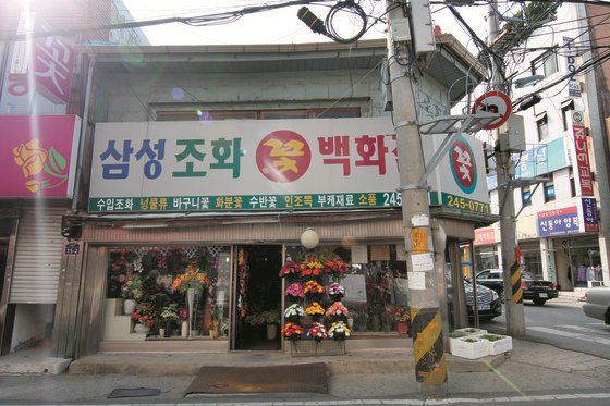 중앙시장~목포여고간_관통도로내_점포1(2011년).png
